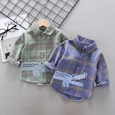 Description Spring Autumn Shirt with Crocodile Design for Boys An over-the-top print-over shirt featuring long sleeves, a turn-down collar, and buttons down the front. Material: 80% Cotton + 20% Polyester Gender: Boys Size Chart INCH Size Length Size Height Range Bust 9-12M 14.1 31.5 23.6-29.5 10.6 18-24M 14.9 35.4 29.5-33.4 11.2 3T 15.7 39.3 33.4-37.4 11.8 4T 16.5 43.3 37.4-41.3 12.4 5T 17.3 47.2 41.3-45.2 12.9 Size Chart CM Size Length Size Height Range Bust 9-12M 36 80 60-75 27 18-24M 38 90 7 Clothes Spring, Infant Boy, Boys Plaid, Cotton Long Sleeve Shirt, Crop Top Blouse, Dress Suits, Two Piece Dress, Preppy Style, Cotton Tops