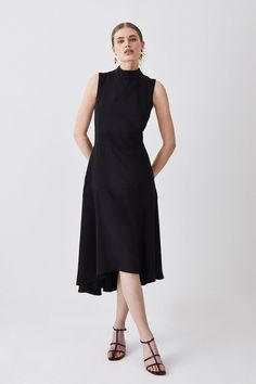 Dress to impress with this stylish tailored dress. Designed in a mid-length with a figure-flattering fitted waist, it features a high neck and asymmetrical hem for a unique touch. High Low Midi Dress, Black Attire, Soft Tailoring, Strong Shoulders, Unique Prom Dresses, Tailored Dress, Karen Millen, Asymmetrical Hem, Fashion Face