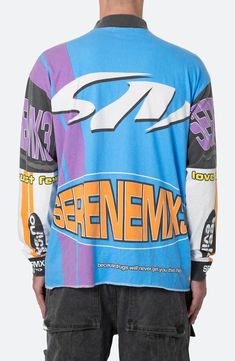 Race off into the weekend with this graphic-bedecked T-shirt framed by long sleeves for layer-ready warmth. 28" length Mock neck Long sleeves 78% cotton, 22% polyester Machine wash, dry flat Imported Fall Long Sleeve T-shirt With Sublimation Print, Urban Long Sleeve T-shirt For Streetwear, Casual Long Sleeve T-shirt With Sublimation Print, Long Sleeve Graffiti Print Top For Streetwear, Blue Graffiti Print Tops For Streetwear, Casual Long Sleeve T-shirt With Graffiti Print, Urban Long Sleeve Tops With Logo Print, Long Sleeve Tops With Letter Print For Streetwear, Blue Cotton Tops With Graffiti Print