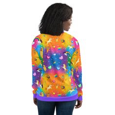 Add a little zing to your wardrobe with this vibrant All-Over Print Bomber Jacket. Wear it on a basic t-shirt, or layer it on top of a warm hoodie—it’ll look great either way. With a brushed fleece inside, and a relaxed unisex fit, this Bomber Jacket is just the stuff of the dreams, so be quick to grab yourself one! • 100% polyester • Fabric weight: 6.49 oz/yd² (220 g/m²), weight may vary by 5% • Brushed fleece fabric inside • Unisex fit • Overlock seams • Sturdy neck tape • Silver YKK zipper • Fun Winter Streetwear Outerwear, Trendy Rainbow Long Sleeve Sweater, Trendy Long Sleeve Rainbow Sweater, Trendy Colorful Winter Tops, Colorful Trendy Winter Tops, Rainbow Casual Winter Hoodie, Casual Winter Rainbow Hoodie, Fun Multicolor Long Sleeve Outerwear, Rainbow Long Sleeve Sweatshirt For Winter