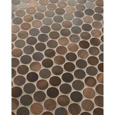 a wooden surface with circles on it