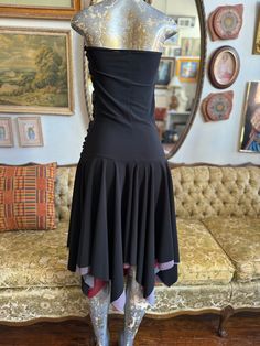 This Boho Asymmetrical Dress from the 2000s is a must-have for any fashion-forward individual. With its unique design, this dress is sure to make a statement and elevate any outfit. Stay ahead of the fashion game with this trendy and stylish dress. size: m pit to pit: 14” waist: 28-30” length: 44” pre-owned Fitted High-low Midi Dress For Summer, Fitted High Low Dress For Summer, Fitted Asymmetrical High Low Summer Dress, Fitted High Low Dress For Summer Party, Asymmetrical High Low Summer Dress, Fitted High Low Summer Party Dress, Summer Fitted High Low Dress With Asymmetrical Hem, Fitted Sleeveless High Low Dress, Stretch Evening Dresses With Asymmetrical Skirt