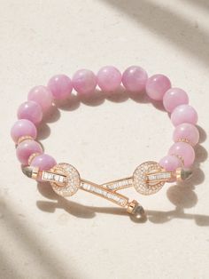 ANANYA’s ‘Chakra’ bracelet is crafted from 18-karat rose gold and strung with kunzite beads, selected for their rich color and believed healing properties. It has two diamond-encrusted bars tipped with quartz crystals, and makes a thoughtful gift for someone special.