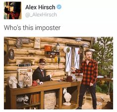 two men standing in front of a desk with items on it and the caption says, who's this imposter?