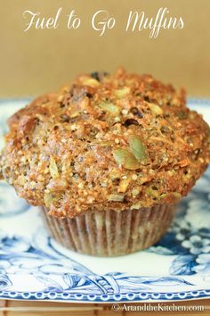 a muffin sitting on top of a plate with the words fuel to go muffins