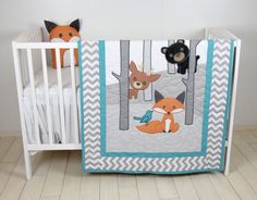 a baby crib with two stuffed animals on it