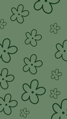 a green background with black and white flowers