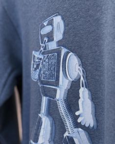 a robot t - shirt that has been drawn on