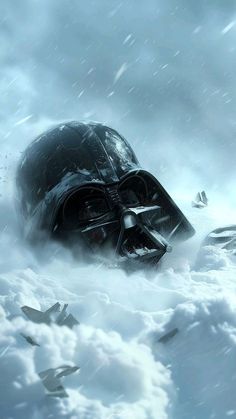 a darth vader helmet in the snow