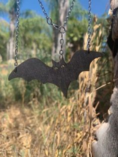 Add some charm to your Halloween ensemble with our playful laser cut wood earrings, perfect for both kids and adults alike! Vampire Necklace, Bat Jewelry, Bat Necklace, Mitten Ornaments, Red Sunflowers, Halloween Pendant, Halloween Necklace, Halloween Bat