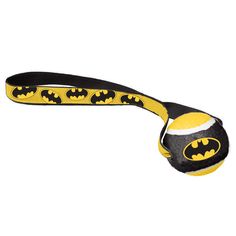 a black and yellow ball with batman logo on it