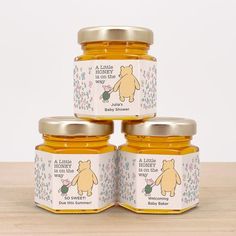 three jars of honey with winnie the pooh on them