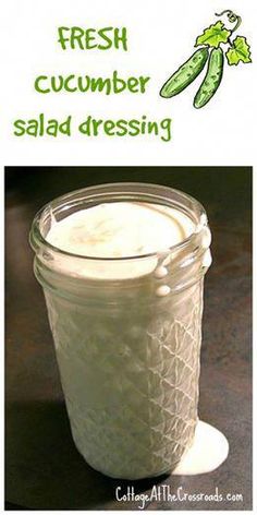 fresh cucumber salad dressing in a glass jar with the words, fresh cucumber salad dressing