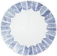 a blue and white plate with an abstract design