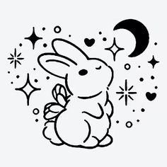 a rabbit sitting on the ground with stars around it