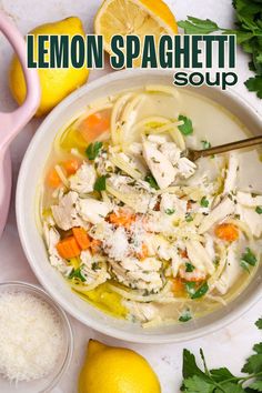 a bowl of lemon spaghetti soup with chicken and parsley