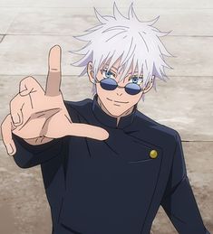 a man with white hair and glasses making the peace sign