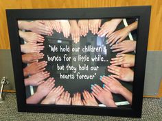 a group of people holding their hands together with the words we hold our children's hearts for a little while, but they hold our hearts forever