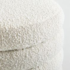 a close up view of a white pillow