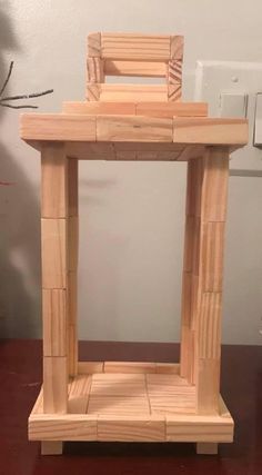 a wooden table sitting on top of a desk