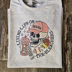 a t - shirt with a skull wearing a baseball cap