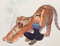 a woman sitting on top of a tiger next to another person with her arm in the air