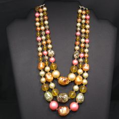 *Description: This is a beautiful Japan necklace which has a variety of multicolored round glass beads with accent art beads which have been hand painted so no two are alike. The necklace also has small bugle beads as spacers, from the 1950s. Japan necklaces have very unique and artistic bead accents. Each one is a beautiful piece of art and no two are alike. This would be a great addition to your vintage jewelry collection or make a great vintage gift! *Approximate Measurements: Length - 17 Inc Vintage Multicolor Multi-strand Beads, Vintage Multicolor Beaded Jewelry, Vintage Multi-strand Colorful Beaded Necklaces, Vintage Multi-strand Beaded Necklaces With Colorful Beads, Vintage Multi-strand Beaded Necklace With Colorful Beads, Multicolor Retro Jewelry For Vintage Collection, Vintage Jewelry With Large Round Beads, Vintage Beaded Necklaces With Colorful Beads, Vintage Czech Glass Beaded Necklace