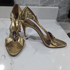 Gorgeous Heels! Gucci Heels Gold, Chic Gold Gucci Heels, Gucci Gold Round Toe Heels, Gucci Formal Heels With Gold-tone Hardware, Gucci Evening Heels With Gold-tone Hardware, Gorgeous Heels, Shoes Gucci, Gucci Shoes, Python