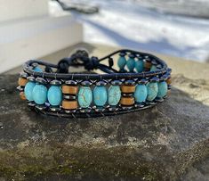 Rustic Adjustable Turquoise Beaded Bracelets, Bohemian Leather Beaded Bracelet For Healing, Rustic Blue Adjustable Beaded Bracelets, Rustic Adjustable Blue Beaded Bracelet, Rustic Blue Adjustable Beaded Bracelet, Handmade Turquoise Wrap Bracelet, Bohemian Black Beads Adjustable Wrap Bracelet, Bohemian Black Beads Wrap Bracelet Gift, Bohemian Wrap Bracelet With Black Beads For Gift