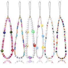 PRICES MAY VARY. Beaded Lanyard for Phone: There are 6 pieces of beaded mobile phone lanyard. The exquisite mobile phone chain is equipped with clay beads, evil eye, fruit, flower and ''LOVE'' letter. The random combination of a variety of beads can meet the color matching requirements of your different mobile phone cases, and you can easily match them with your clothes. Use: The hand strap is strong enough to withstand items such as cell phones, wallets,cameras, mp3, keychains, id cards, u disk Mobile Charms, Beaded Phone Lanyard, Beads Lanyard, Keychain Beads, Beaded Mobile, Star Pearl, Rainbow Pearl, Beaded Lanyard, Phone Lanyard