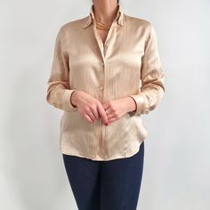 Beautiful vintage blouse in cream made from satin, silk and cotton mix fabric. It has a simple shape with slighty nipped waist, a collar, rounded hemline and long cuffed sleeves. Perfect, timeless blouse for casual or smart outfits. No brand label. 45% silk, 55% cotton. No size label, would fit Small size to fitted Medium. Measurements when laid flat are: Pit to pit: 48cm Waist: 44cm Sleeves length: 58cm  Length: 64cm, back slightly longer by 3.5cm. Great condition, apart there is round shape, f Collared Satin Blouse For Daywear, Satin Collared Blouse For Daywear, Elegant Cream Satin Top, Elegant Collared Beige Blouse, Classic Satin Button-up Tops, Elegant Beige Collared Blouse, Satin Button-up Blouse For Daywear, Chic Solid Color Silk Shirt, Chic Satin Top With Spread Collar