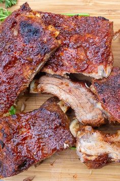 barbecue ribs on a cutting board with parsley