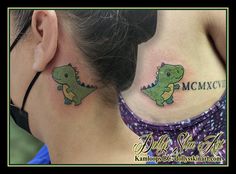 two small tattoos on the back of their neck