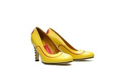 This yellow handmade high heel leather pump truly presents phrase: Shoe love is true love! Made in yellow color from softest leather they are celebration of shoes. Embellished with the piping and heart details on the back, they are special as every woman wearing them. Extremely comfortable high heel pump is every women's dream and the moment you try these beauties they become your best friend for years to come. Signature with striped heel, they are unique and recognizable as you are. Wear them w Yellow High Heels With Sculpted Heel, Yellow Round Toe Heels For Wedding, Yellow Heels With Sculpted Heel And Round Toe, Yellow Almond Toe Heels With Padded Heel, Yellow Retro High Heels, Yellow Round Toe Heels With Sculpted Heel, Retro Yellow High Heels, Yellow Court Shoes With 4-inch Heel And Round Toe, Closed Toe Yellow Heels