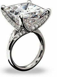 an engagement ring with a princess cut diamond