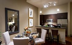 a kitchen and dining room area in a home