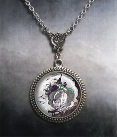 Antique Fairytale Witch Art Nouveau necklace ~ This pretty little witch is from an antique fairytale illustration.  The glass pendant is set into a necklace featuring a beautifully detailed reproduction of an Art Nouveau connector and it's a great gift for your favorite witch or Wiccan.   The pendant measures 1-3/16" across (30mm) and the artwork is covered by a crystal clear, domed glass cabochon which protects and enhances the image for a truly beautiful effect!  The necklace closes with a lobster clasp and has a 2" extension chain, so an 18" necklace will adjust up to 20", a 21" necklace adjusts up to 23", etc.  If you would prefer to not have the extension chain, please leave us a note at checkout. We have 4 chain lengths available at checkout and custom lengths are also available at n Fairytale Witch, Witch Pendant, Art Nouveau Necklaces, Witch Necklace, Art Nouveau Antiques, Witch Gift, Wiccan Jewelry, Fairytale Illustration, Witch Jewelry