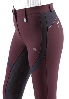 the side view of a woman's leggings in maroon and black