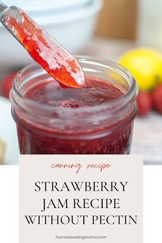 strawberry jam recipe without pectin in a mason jar with a spoon full of jam