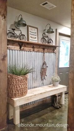 a wooden bench sitting next to a potted plant on top of a metal shelf