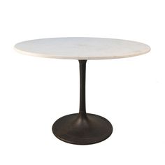 a white marble table with an iron base