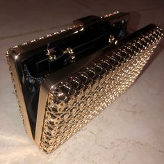 Cute Black & Gold Clutch Purse From Atmosphere With A Chain To Turn Into A Crossbody Purse. Will Go Perfectly With Your Sexy Lbd & Slinky/Strapping Heels. Never Used! Trendy Metal Evening Bag, Trendy Metal Evening Bags, Trendy Evening Metal Bags, Metal Evening Bag With Chain Strap For Party, Chic Rectangular Metal Bag, Chic Metal Evening Bag With Chain Strap, Glamorous Evening Bag With Chain Strap For Night Out, Glamorous Chain Strap Evening Bag For Night Out, Chic Metal Clutch Bag