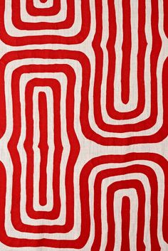 red and white fabric with wavy lines on it