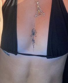 a woman with a tattoo on her chest