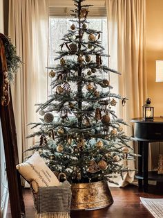 a decorated christmas tree in a living room