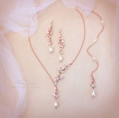 three necklaces with pearls on top of each other