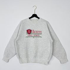 Vintage 90s Ohio State University Sweatshirt Ohio State Crewneck Ohio State Sweater Pullover Ohio State Buckeyes Embroidered Logo Medium Brand Name :- Ohio State University  Tag Size :- Large Recommend Size :- Fits Medium Manual Measurement :- WIDTH (armpit to armpit) :- 23 inches / 58cm LENGTH (shoulder to end of garment) :- 26 inches / 66cm Condition :- Used Good Condition 8/10. Minor Defect Stain Refer Picture.                     - Colors Might Be Different Due To Lighting. DHL EXPRESS = 3-6 Vintage Sweater With Embroidered Logo For Fall, Vintage Embroidered Sweater For Fall, Vintage Sweater With Embroidered Logo For College, 90s Embroidered Fall Sweatshirt, 90s Embroidered Sweatshirt For Fall, Vintage Embroidered Sweatshirt, State Crewneck, University Sweatshirts, Ohio State University