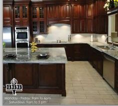 a large kitchen with wooden cabinets and marble counter tops is featured in this ad for bbb