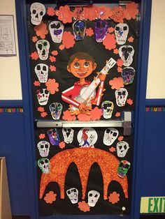 CoCo/Dia De Los Muertos inspired door decorating. 2018.  Sugar skulls, marigold flowers and marigold bridge was done by my preschoolers. Miguel with a guitar and Miguel and Dante Illustrations were done by me. Coco Halloween Door Decorations, Coco Classroom Door Decoration, Coco Door Decoration, Coco Door Decorations Classroom, Coco Classroom Door, Coco Bulletin Board, Day Of The Dead Door Decorations, Dia De Los Muertos Classroom Door Ideas, Dia De Los Muertos Classroom Ideas