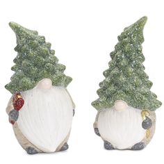 two ceramic figurines with christmas trees on their heads